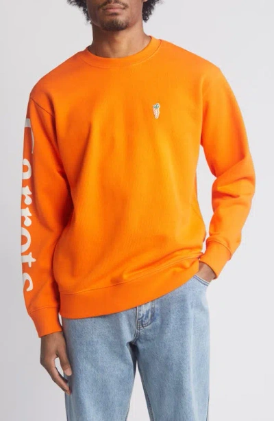 Carrots By Anwar Carrots Wordmark Long Sleeve Cotton Graphic T-shirt In Orange