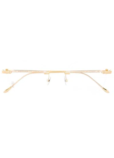 Cartier Engraved-logo Frameless Glasses In Gold