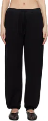 Carven Crepe-trimmed Cotton-jersey Track Pants In Deep Black