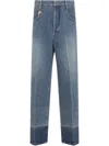 Carven Cotton Five-pocket Jeans With Key Pendant Detail In Washed Denim