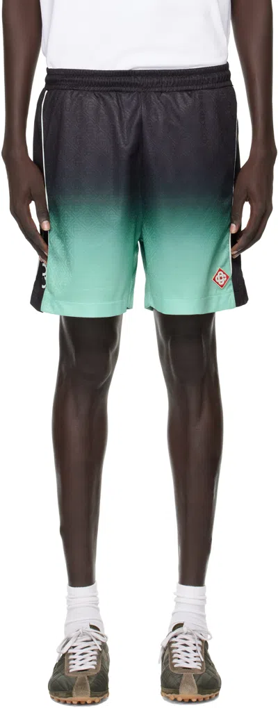 CASABLANCA BLACK & GREEN GRADIENT MONOGRAM FOOTBALL SHORTS