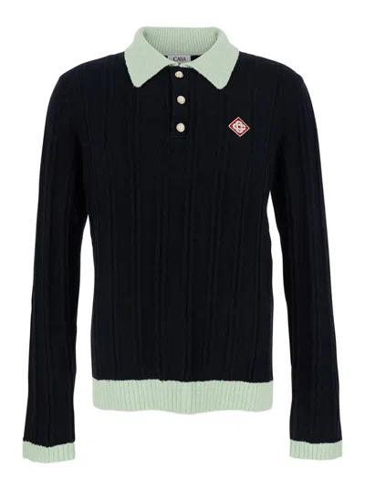 CASABLANCA BLACK POLO SHIRT WITH CLASSIC COLLAR AND LOGO PATCH ON THE FRONT IN COTTON BLEND MAN