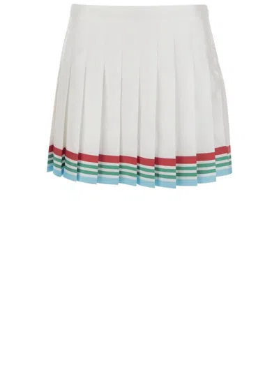 CASABLANCA HIGH-WAISTED PLEATED SILK SKIRT WITH COLORFUL HEMLINE