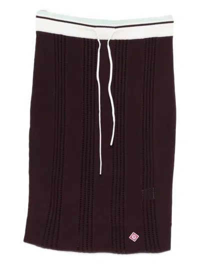 CASABLANCA KNEE-LENGTH FITTED SKIRT WITH VERTICAL OPEN-KNIT STRIPES