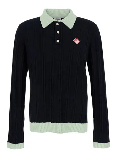CASABLANCA CASABLANCA MEN BLACK POLO SHIRT WITH CLASSIC COLLAR AND LOGO PATCH ON THE FRONT IN COTTON BLEND MAN
