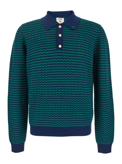 CASABLANCA 'MINI WAVE' BLUE POLO SHIRT WITH LOGO EMBROIDERY ON THE COLLAR AND ALL-OVER STRIPED MOTIF IN WOOL MA