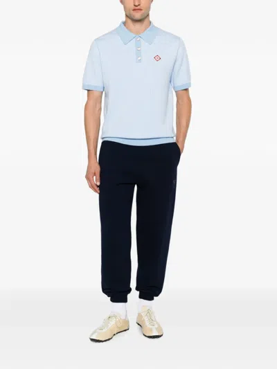 Casablanca Striped Cotton Knit Polo Shirt With Ribbed Collar And Cuffs In Blue