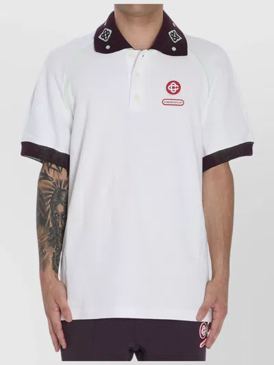 CASABLANCA OVERSIZED POLO SHIRT FEATURING POINTED COLLAR
