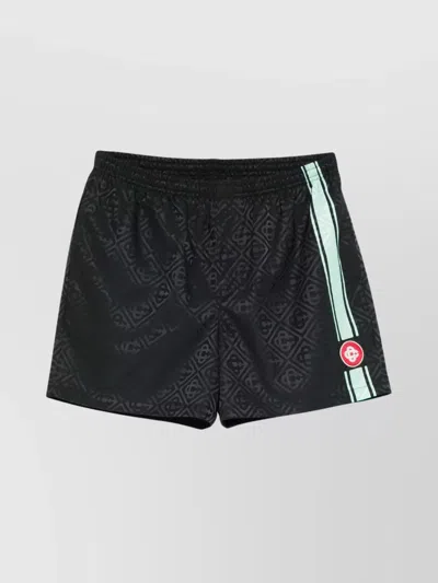 CASABLANCA PATTERNED SHORTS WITH ELASTIC WAISTBAND AND SIDE STRIPE