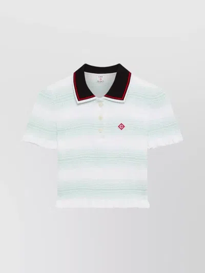 CASABLANCA POLO TOP WITH SMOCKED DESIGN AND RUFFLES