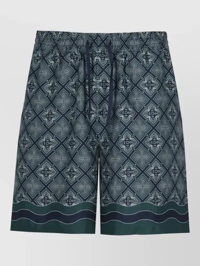 Casablanca Silk Bermuda Shorts Radiating Monogram Pattern In Blue