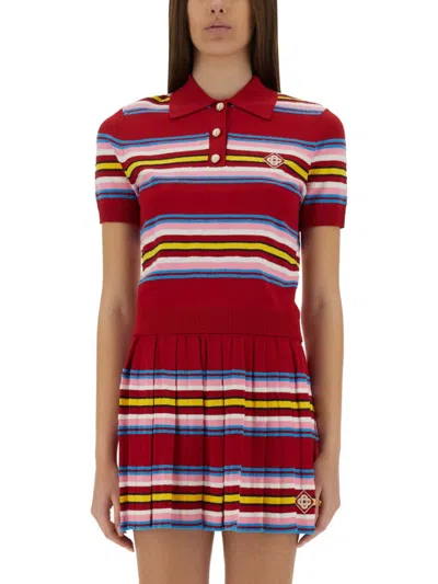 Casablanca Vibrant Striped Cropped Polo With Pleated Skirt In Red