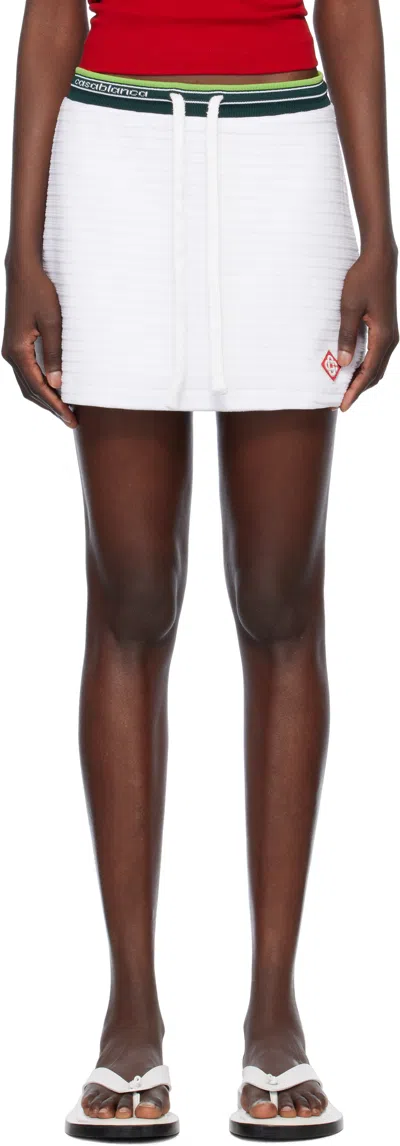 CASABLANCA WHITE TEXTURED VELOUR TENNIS MINISKIRT