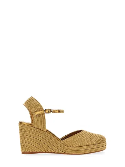 Castaã±er 'carolyn' Gold Wedge With Ankle Strap In Metallic Rafia Woman In Brown