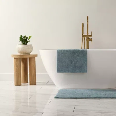 Casual Comfort Solid Reversible Bath Rug In Blue