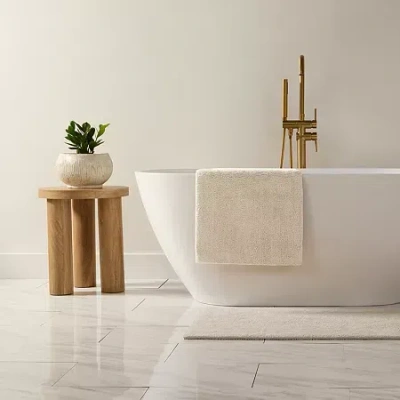 Casual Comfort Solid Reversible Bath Rug In White