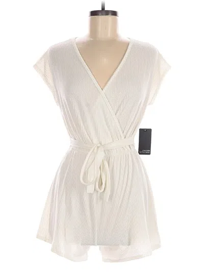 Caution To The Wind Romper In Ivory