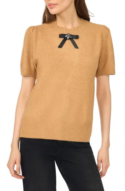Cece Bow Short Sleeve Crewneck Sweater In Brown