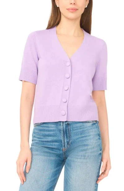 Cece Covered Button Short Sleeve Cardigan In Purple