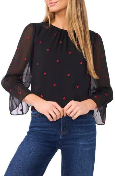 Cece Embroidered Heart Bell Sleeve High-low Top In Black