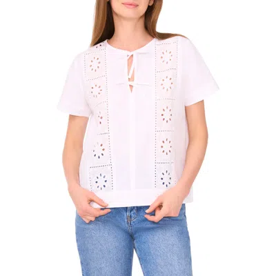 Cece Eyelet Embroidered Tie Neck Cotton Top In White