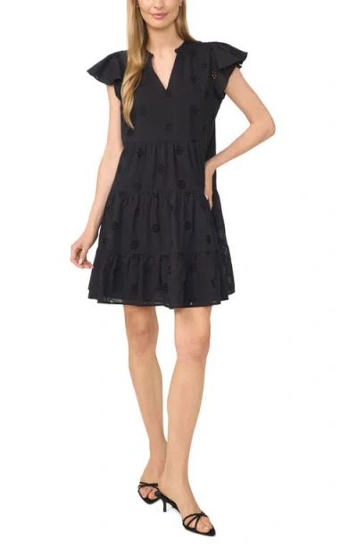 Cece Eyelet Tiered Minidress In Black