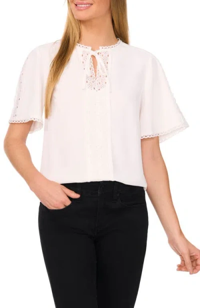 Cece Eyelet Trim Moss Crepe Top In New Ivory White