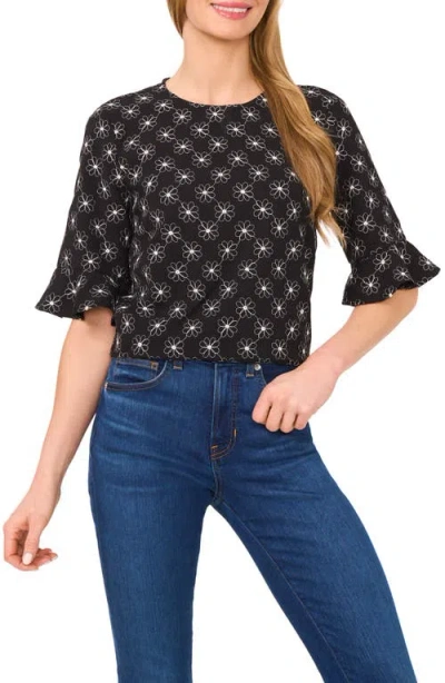 Cece Floral Embroidered Ruffle Cuff Top In Black