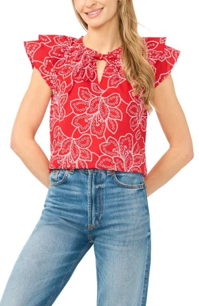 Cece Floral Flutter Sleeve Tie Neck Top In Red