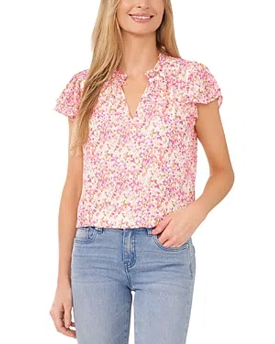 Cece Floral Flutter Sleeve Top In Peach Coral