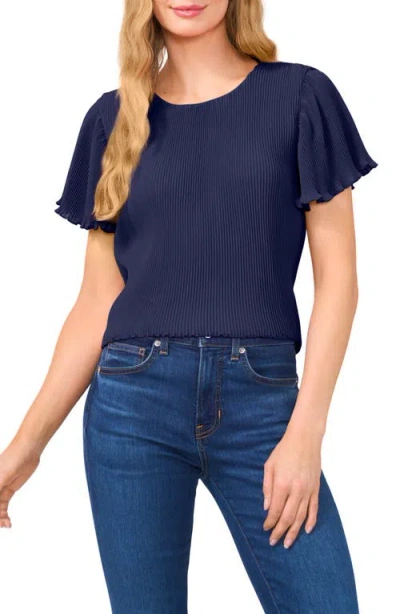 Cece Flutter Sleeve Plissé Top In Classic Navy