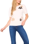 Cece Groovy Flower Short Sleeve Sweater In White