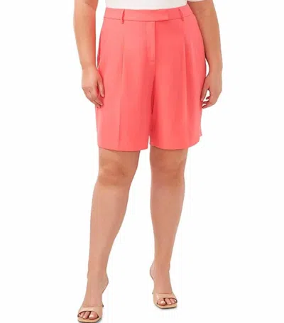 Cece High Waisted Pleated Dress Bermuda Shorts In Coral In Red