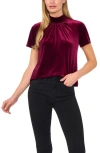Cece Mock Neck Cutout Stretch Velvet Top In Majestic Wine