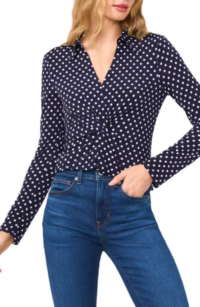 Cece Polka Dot Long Sleeve Twist Front Top In Classic Navy
