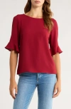 Cece Ruffle Cuff Blouse In Burgundy