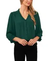 Cece Ruffle Trim Blouse In Alpine Green