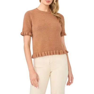 Cece Ruffle Trim Short Sleeve Sweater In Brown