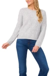 Cece Sequin Cable Stitch Sweater In Silver