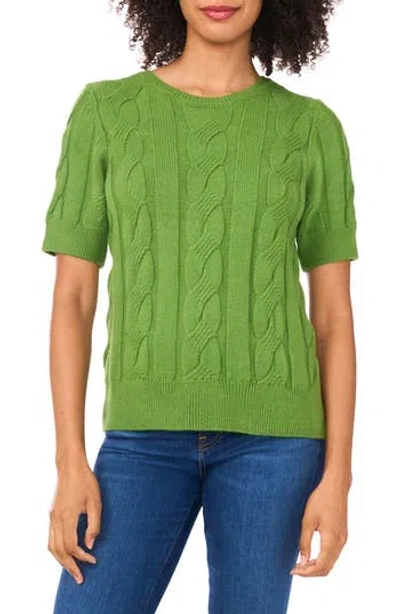 Cece Short Sleeve Cable Stitch Sweater In Green