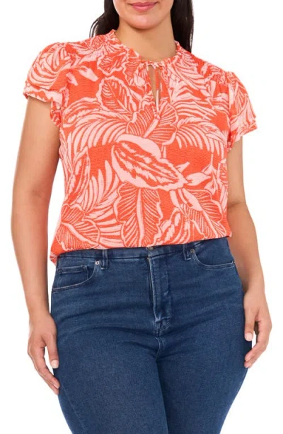 Cece Smocked Tie Neck Flutter Sleeve Top In Orange