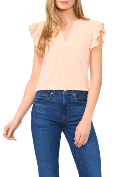 Cece V-neck Flutter Sleeve Shirt In Peach Fuzz