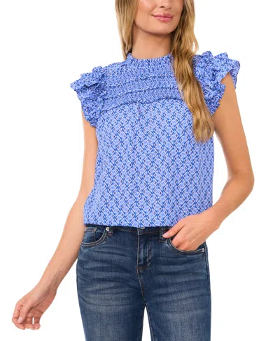 Cece Geo Print Smocked Flutter Sleeve Top In Tropic Night
