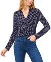 Cece Polka Dot Long Sleeve Twist Front Top In Classic Navy