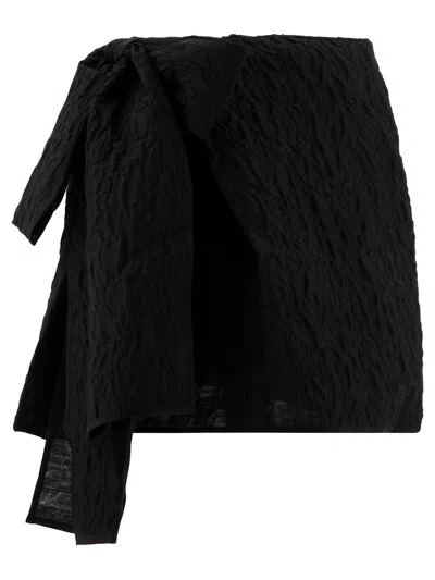Cecilie Bahnsen Bow Wrap Mini Skirt In Textured Fabric In Black