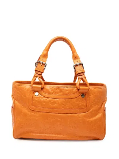 Pre-owned Celine 2000-2020 Spiraling Macadam Embossed Leather Boogie Handbag In Orange