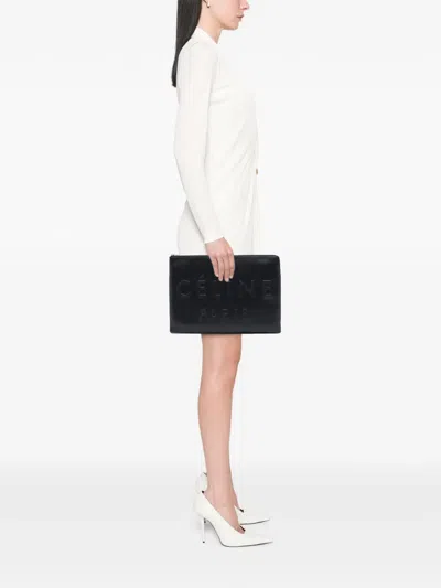 Pre-owned Celine 2018 Embossed Leather Logo Clutch Bag In Black