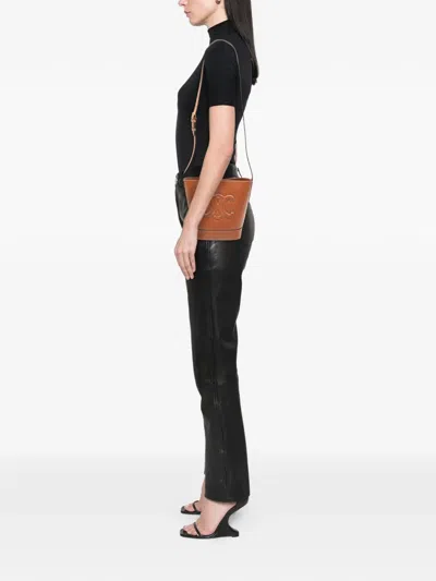 Pre-owned Celine 2024 Small Calfskin Cuir Triomphe Bucket Bag In Brown