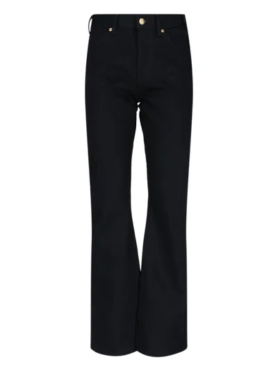 CELINE CÉLINE BOOTCUT JEANS WITH CLASSIC FIVE-POCKET DESIGN AND FLARED HEM