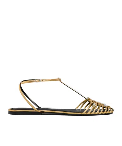 Celine Cage Flat Sandal In Laminated Lambskin In Gold